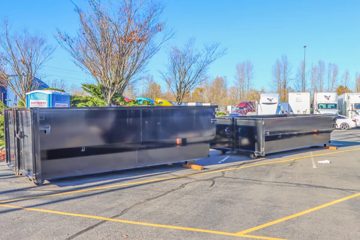 Professional dumpster rental service with roll-off container on residential driveway in Chicago Ridge